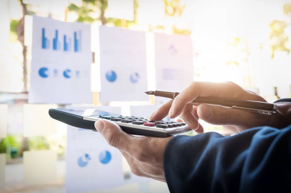 business-finance-man-calculating-budget-numbers-invoices-financial-adviser-working